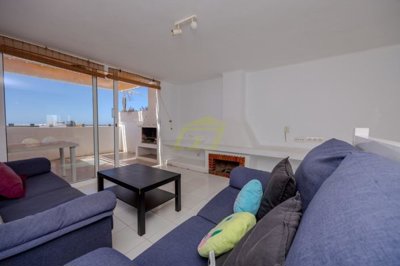 Spacious frontline property moments from the beach with a communal pool
