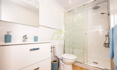 Renovated top floor apartment with pool views