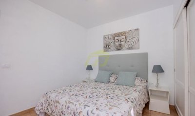 Renovated top floor apartment with pool views