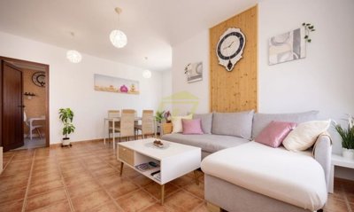 Top floor apartment with terrace, mountain views and off-road parking