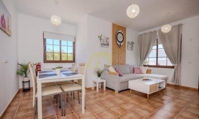 Top floor apartment with terrace, mountain views and off-road parking