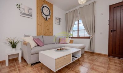 Top floor apartment with terrace, mountain views and off-road parking