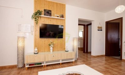 Top floor apartment with terrace, mountain views and off-road parking
