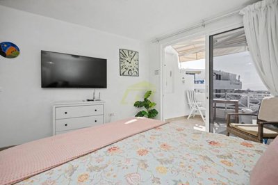 A beautifully renovated apartment with spectacular pool and sea views