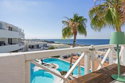 A beautifully renovated apartment with spectacular pool and sea views