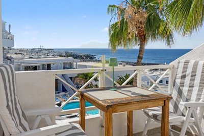 A beautifully renovated apartment with spectacular pool and sea views