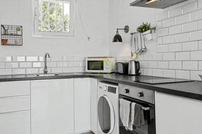 A beautifully renovated apartment with spectacular pool and sea views