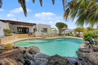 Exclusive property, heated pool, guest annex, walk to town.