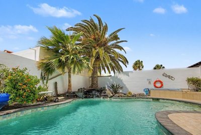 Exclusive property, heated pool, guest annex, walk to town.
