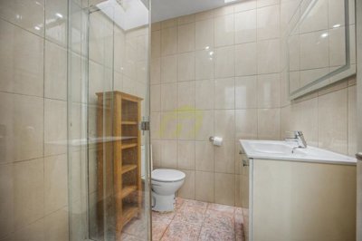 Bright two-bedroom apartment with large south-facing terrace near the beach