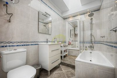Frontline property with sea views and communal pool