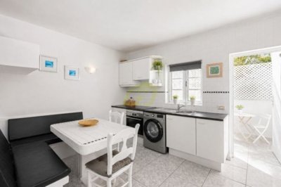 Frontline property with sea views and communal pool