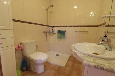 Ground floor property with large terrace moments from the beach