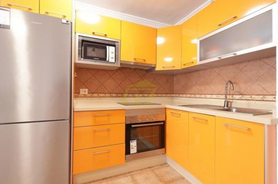 Ground floor property with large terrace moments from the beach
