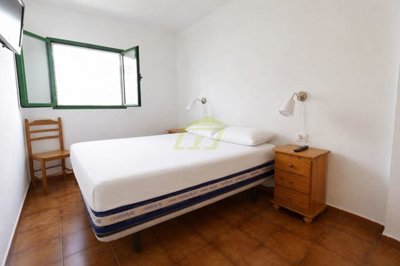 Ground floor property with large terrace moments from the beach