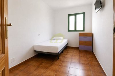 Ground floor property with large terrace moments from the beach
