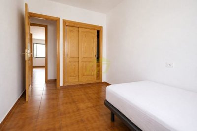 Ground floor property with large terrace moments from the beach