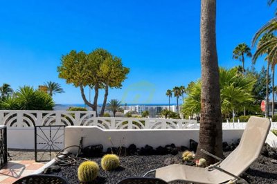 A stunning bungalow with access to a shared pool close to the beach