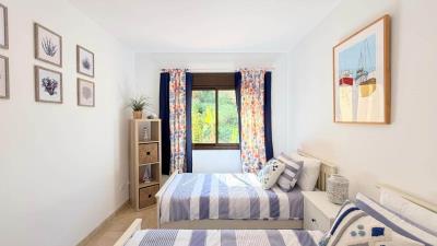 Duquesa-Village-513-KIWII-Real-Estate-Guest-Bedroom