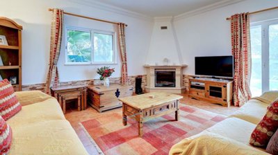lots of natural light from the windows and patio doors