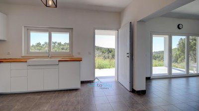 bright and airy kitchen to dining area