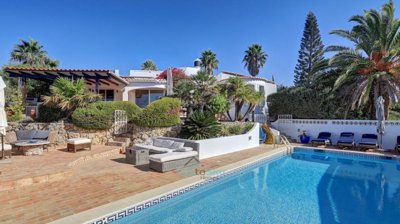 villa with heated pool