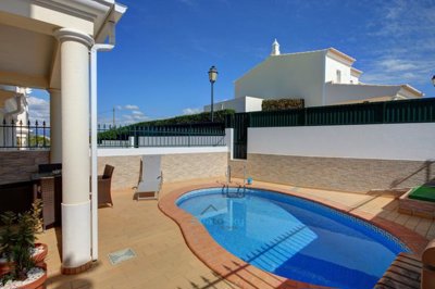covered terrace and pool