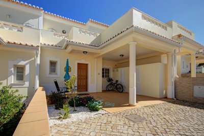 mid-row unit with carport