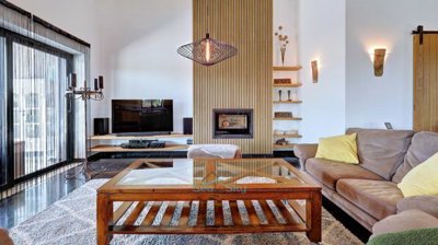feature wooden floor to ceiling fireplace back drop