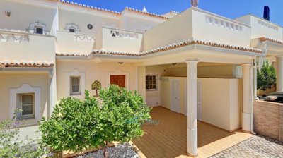 mid-row home with carport