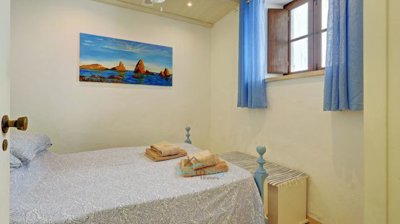 compact bedroom with window