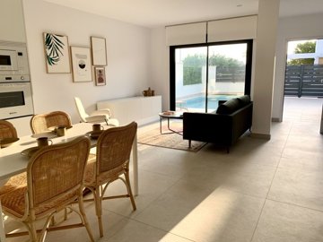 9villasonrodagolf130924120957livingdiningarea