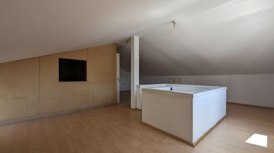 Three storey semi-detached mixed use building with shop and attic in Strovolos, Nicosia