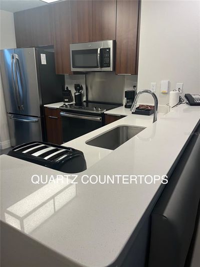 Image No.13-2 Bed Property for sale