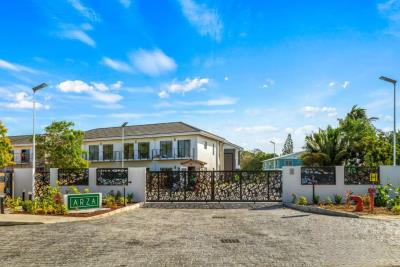 Arza-2BR-Den-Walkout-Patio-Entrance-Cayman-Islands-Real-Estate