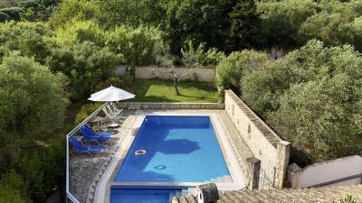 For-Sale---Villa--120-sqm-on-2-000-sqm-Land-with-Pool---Water-Reservoir-in-Agios-Georgios-Pagon--2-