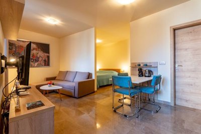 5-3-studio-apartments-with-a-pool-and-land-pa