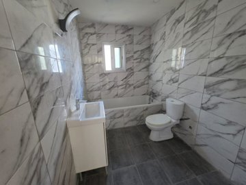 Ground Floor Apartment For Sale  in  Peyia