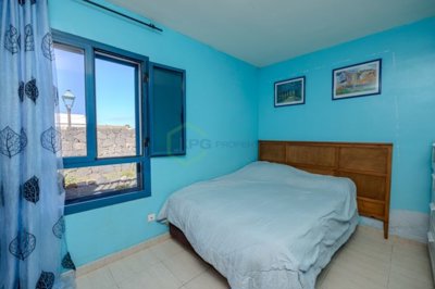 Spacious Playa Blanca villa with pool, guest apartment, and potential.