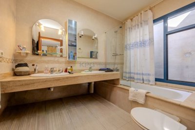 Spacious Playa Blanca villa with pool, guest apartment, and potential.