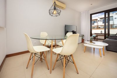 Stylish Duplex with Pool Views and Private Parking in Exclusive Puerto Calero