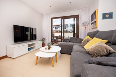 Stylish Duplex with Pool Views and Private Parking in Exclusive Puerto Calero