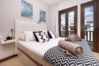 Stylish Duplex with Pool Views and Private Parking in Exclusive Puerto Calero