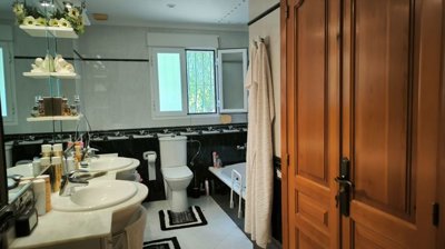 spacious-bathroom-featuring-a-double-vanity-l