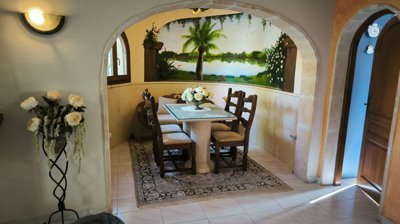 rustic-dining-set-with-a-stone-pedestal-table