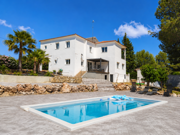 white-two-story-house-luxury-pool-patio