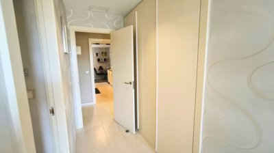 built-in-wardrobes-in-the-main-bedroom-with-b