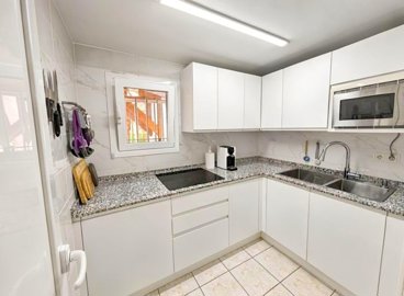 bright-modern-l-shaped-kitchen-with-stainless
