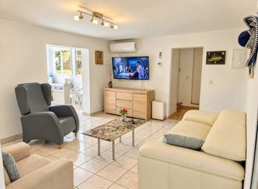 bright-living-room-with-air-conditioning-and-